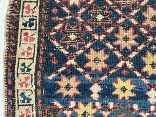 Antique large bagface, probably northwest Persian Kurdish, with an unusual star filled lattice. I like the “clover” border. Overall fair condition with some wear and oxidized blacks. All natural colors. As found,  ...