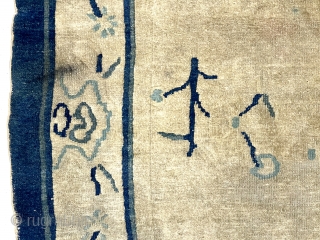 Old Chinese rug with an unusual and spacious field and border design. I have never had or seen this interesting design. No idea of the possible symbolism or is this just an  ...