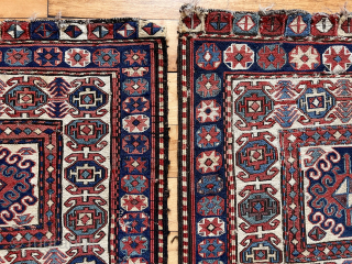 Original pair of soumak bagfaces. Ivory ground. Interesting design. Good natural colors with yellow highlights. Rough edges and some torn wefting on one. Reasonably clean. 19th c. Each app 21” sq.  