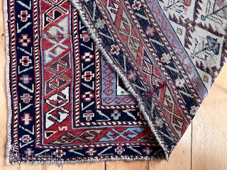 Small antique ivory ground shirvan prayer rug. Appears to have some corroded magenta silk highlights. Reasonably fine weave. Overall fair condition with low pile and scattered small spots of light wear as  ...