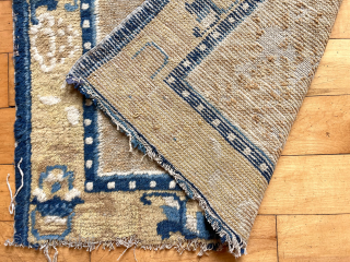 Early Chinese square. Soft wool and floppy old handle. Low pile and some oxidation. Ends unraveling. Ex R. Newman. Reasonably clean. Ca. 1800  24” x 27”      