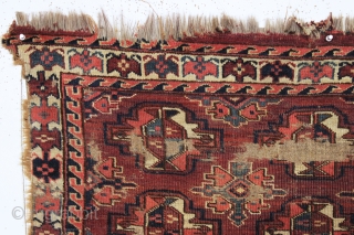 antique turkman yomud chuval. Older example unfortunately ravaged by wolves. Nicely drawn field and better than average elem panel. All natural colors. As found condition and priced accordingly. Ca. 1870 or earlier.  ...