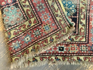 Antique rug. Unusual design. Northwest Persian? Caucasian? Mystery? Restorable. With wear and edge roughness as shown. Priced accordingly. Late 19th c. 4'3" x 8'6"         