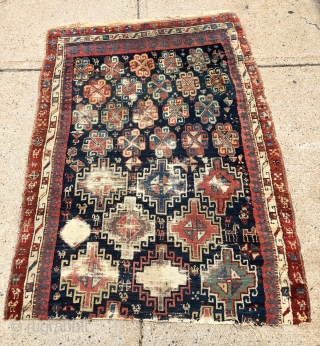 Early tribal rug fragment, probably northwest Persian with an interesting design featuring large memling guls and colorful endless knots. Add in many little animals and you have quite a charming weaving. All  ...