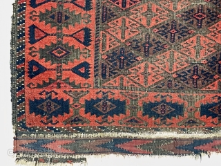 Antique little Baluch rug with an attractive uncommon border. Classic tile design field. All natural color featuring a deep rich red. Nice kelim ends. Wear and creases as shown. Substantial black oxidation.  ...