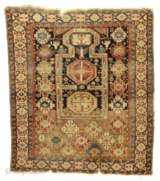 Antique caucasian kuba prayer rug. Rare type. Kufic border. Inscribed and dated? All good natural colors. No chemical dyes. Rough condition with very low pile and slight damage as shown. Recent wash.  ...