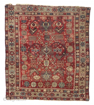 antique caucasian rug, probably shirvan. Local fresh find. Older variant of a well known design. The numerous endless knots are an interesting addition to the archaic main floral devices. "as found", very  ...