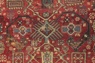 antique caucasian rug, probably shirvan. Local fresh find. Older variant of a well known design. The numerous endless knots are an interesting addition to the archaic main floral devices. "as found", very  ...