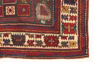 early large kazak rug with real green ground and an exceptionally colorful border. All splendid natural colors featuring beautiful greens, excellent reds, a nice aubergine and clear yellow/gold highlights. The extra attention  ...