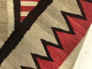 Antique small Navajo rug with a very eye catching design. Fresh New England find. Beautiful colors and soft blanket like handle. In reasonably good condition with some slight selvage roughness and a  ...