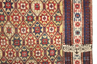 large yellow ground antique kazak rug with a unique design feature. A small ivory panel woven into the rug as shown. When i first saw the rug i was certain this was  ...