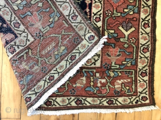 Antique northwest Persian runner with a lovely floral design field and border. As found, reasonably clean and in very good condition with even pile and good edges. All natural colors including fine  ...