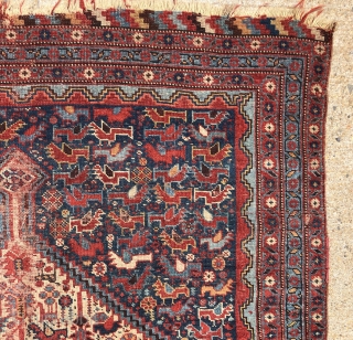 Antique south Persian qashqai small bird design rug. Flocks of beautifully colored little birds fill the field and ivory medallions. Pile varies from good even low to very low to none in  ...