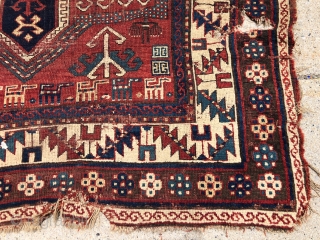 Antique Kazak rug fragment with a charming row of animals. Some decent pile. Some wear and brown oxidation. Edges all tattered. Reasonably clean. Offered for project or pillow? 19th c. 3’3” x  ...