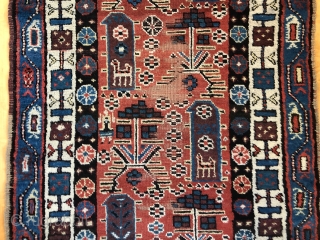 Antique Persian tribal runner with many charming animals and folky human figures. Probably Luri or Kurdish. Pile mostly good thick medium length with some scattered field areas low and worn as shown.  ...