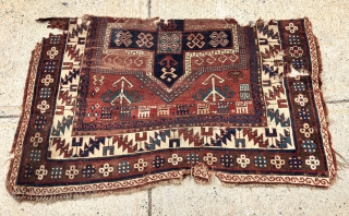 Antique Kazak rug fragment with a charming row of animals. Some decent pile. Some wear and brown oxidation. Edges all tattered. Reasonably clean. Offered for project or pillow? 19th c. 3’3” x  ...
