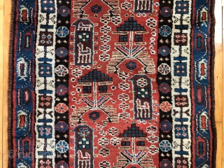 Antique Persian tribal runner with many charming animals and folky human figures. Probably Luri or Kurdish. Pile mostly good thick medium length with some scattered field areas low and worn as shown.  ...