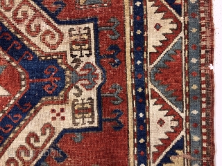Antique fachralo Kazak prayer rug. Early example with spacious drawing and natural colors. Intact with some decent pile but mostly very low pile, numerous scattered wear spots and a few old little  ...