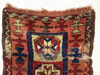 Antique Anatolian yastik. Bold drawing and vibrant natural colors. Remnant original selvages and some end kelim. Areas of wear and damage. Coarse weave. As one late colleague would say “this could be  ...