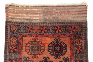 Antique baluch with turkoman like motifs. Has Turkish knotting along outer border and Persian knotting elsewhere. Overall pretty good pile with scattered old moth nibbles and a number of very small holes.  ...