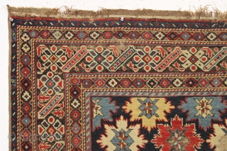 Antique east caucasian snowflake design rug, probabaly shirvan, with a nicely drawn chi chi border. High quality wool and all excellent natural colors. "As found" with damage as shown and priced accordingly.  ...