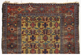 antique yellow ground kuba seichour rug with chi chi design field and an interesting border. In rough condition with wear and damage as shown and priced accordingly. Good colors. ca. 1875. 3'4"  ...