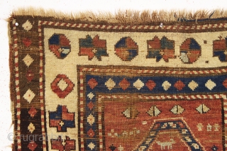 One of the most archaic and powerful little kazak or Karrabaugh prayer rug I have had. Right up there in rough condition as well. Very coarse weave. All good colors. Recently washed.  ...