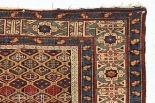 antique yellow ground kuba rug. Older example with all very good natural colors featuring a yellow/gold ground and a lovely green kufic border. Overall low even pile with heavy brown oxidation, edge  ...
