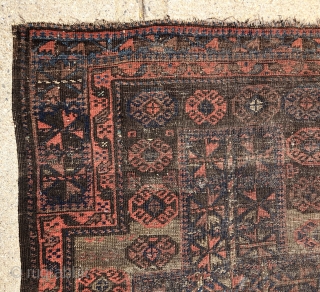 Antique Baluch prayer rug. Interesting somewhat unusual design but very worn and with heavy brown oxidation as shown. Priced accordingly. 19th c. 3’2” x 3’9”        