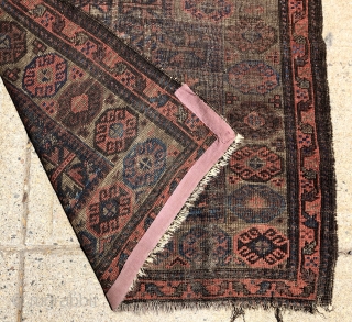 Antique Baluch prayer rug. Interesting somewhat unusual design but very worn and with heavy brown oxidation as shown. Priced accordingly. 19th c. 3’2” x 3’9”        