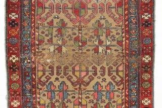 Antique camel ground NW Persian or kurdish rug. Extra colorful version of this known design. "As found" condition, very dirty and with an area of heavy wear as shown. Structurally sound. Good  ...