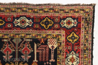 Beautiful antique tribal rug, probably Baktiari, with a great design and superb colors. Mostly thick full pile and terrific nearly square size. Lovely greens, purples and a clear yellow/gold. Wool warps. Clean,  ...