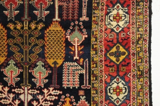 Beautiful antique tribal rug, probably Baktiari, with a great design and superb colors. Mostly thick full pile and terrific nearly square size. Lovely greens, purples and a clear yellow/gold. Wool warps. Clean,  ...