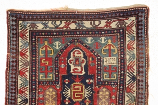 Antique kazak prayer rug. Unusual and eye catching cloudband design. Inscribed date panel (1300 equals 1883). Interesting border as well. "as found", dirty with slight overall wear and edge roughness as shown.  ...