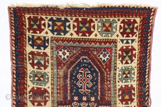 early and archaic kazak prayer rug. An interesting example of a non commercial village weaving. All natural colors. Washed but "as found", with coarse weave, wear and damage as shown. Simple and  ...