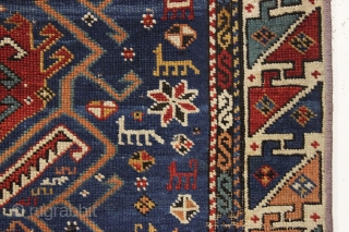 antique kuba rug. Fresh New England find. Interesting design with large tulip palmettes and a jungle of little animals. All good strong natural colors featuring a pretty abrashed medium blue ground and  ...