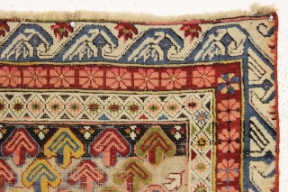 antique little seichour rug with astonishing color. A rainbow of natural colors. Almost completely oxidized brown field. Overall rough condition with wear and damage as shown. Slight edge staining from the crude  ...