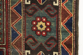 antique large mystery rug with a powerful design. Probably caucasian although certainly not karachopf type as the structure with brown wefting and goat hair selvages are not characteristic kazak. Neither is the  ...