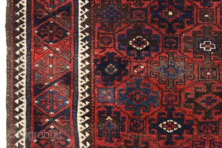 antique baluch rug in excellent condition. Classic baluch lattice design. Thick glossy wool and all natural colors. Original selvages and great kelim ends. I see no repairs. As found, could use a  ...