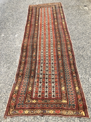 Antique northwest Persian Kurdish long rug with an unusual design, pretty colors and overall good usable condition. Mostly good pile with a little scattered light wear. All natural colors including pretty greens,  ...