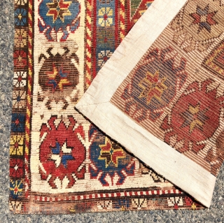 Early Kazak rug with an uncommon field design and an eye catching border. The best example of this type I have encountered. Beautiful old natural colors including lovely old greens. Overall low  ...