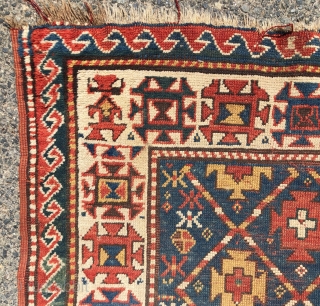 Antique small kazak rug with an uncommon all over design. Freely drawn with a fun candy cane lattice. As found, very very dirty but i can see under the grime the colors  ...