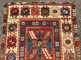 Early Kazak rug with an uncommon field design and an eye catching border. The best example of this type I have encountered. Beautiful old natural colors including lovely old greens. Overall low  ...