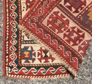 Antique small kazak rug with an uncommon all over design. Freely drawn with a fun candy cane lattice. As found, very very dirty but i can see under the grime the colors  ...