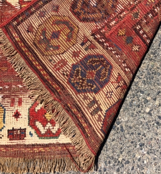 Early tribal Persian long rug, probably shahsavan with exceptional color and bold drawing in both field and ivory border. Pile varies from decent low to very low with some heavy wear to  ...