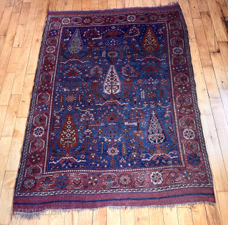 Antique Afshar rug in very good condition with a delicately drawn floral field and rich saturated colors. The intense abrashed blue ground is very attractive. Original flat woven ends and selvages. Untouched  ...