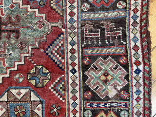 Antique good sized southwest Persian rug, unusually dated (1237?) possibly khamseh, in fairly good condition. Attractive design featuring a large green medallion and an interesting border with animals. Few small old repairs.  ...