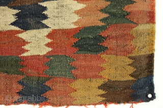 Colorful and unusual old flatweave fragment. All good natural colors including a fine green and 2 yellows. All wool with goat hair warps. Origin? Age? Charming? 21" x 23"    