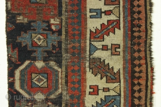 Old rug fragment. Caucasian? Northwest Persian? Kurdish? All natural colors. Interesting design. Just the piece for that narrow wall space. 19th c. 16" x 44"        