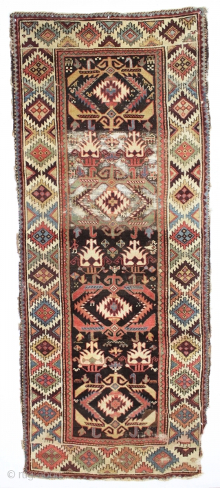 antique tribal long rug, probably nw persian. Interesting design featuring a very attractive bold border. "as found", very dirty with areas of heavy brown oxidation, wear, edge damage, a few stains, old  ...